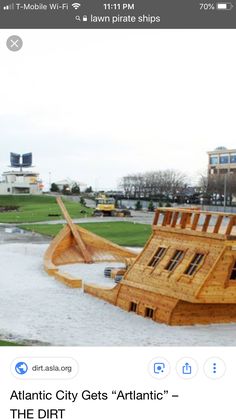 the wooden boat is being displayed on an iphone