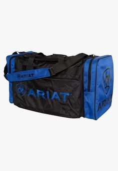 Take on any adventure with the Ariat Gear Bag. Featuring multiple compartments, a detachable shoulder strap and heavy duty fabric to maximise durability and protection. Large gear bag  Heavy duty poly fabric Detachable shoulder strap  Heavy duty zippered end pockets Top zip opening to the main compartment  H14" x W28" Ariat Logo, Saddle Pads English, Horse Gear, Mens Boots Casual, Casual Outerwear, Gear Bag, Purple Bags, Pocket Top, Strap Top