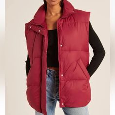 Abercrombie & Fitch Oversized Puffer Vest Red S Small Nwt $99 New With Tags Oversized From Zip And Snap Stand Collar Side Front Welted Hand Pockets Adjustable Hem Bungie Cord Oversized Puffer Vest, Winter Puffer Vest, Feather Vest, Red Puffer Vest, Abercrombie (women), Faux Suede Vest, Sleeveless Puffer, Oversized Puffer, Quilted Puffer Vest