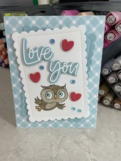 a card with an owl and the words love you