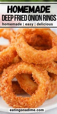 homemade deep fried onion rings on a white plate with text overlay that says homemade deep fried onion rings