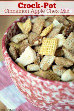 a red and white bowl filled with cracker - pot cinnamon apple chex mix