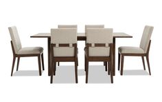 a dining room table and chairs with beige fabric upholstered on the backrests