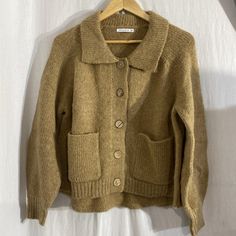 Nwot Staccato Oversized Mustard Brown Button-Up Or Pullover Sweater. 2 Front Pockets. Size:Small. 35% Acrylic 25% Nylon 40% Polyester. Bust: 22” Front Length From Pit: 12” Back Is Slightly Rounded From 12”-14”-12”Length Dry Clean Only. Offers & Counter Offers Welcome! Bundle & Save! Thank You For Stopping By! Hundreds Of New Items Still To List! Please Come Again! Crochet Clothing, Oversized Tunic, Chunky Cardigan, Beige Cardigan, Short Sleeve Cardigan, Oversized Cardigan, Pullover Sweater Women, Striped Cardigan, Color Block Sweater