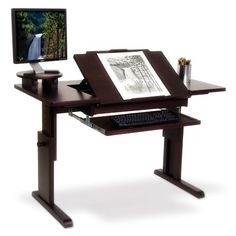 a computer desk with a monitor, keyboard and mouse on it in front of a white background