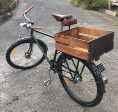 a bicycle with a wooden crate on the back