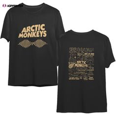 an arctic monkeys t - shirt with the words arctic monkeys written on it in gold