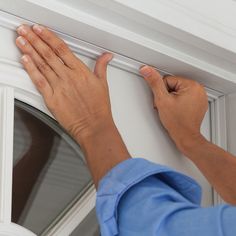 Vinyl Bulb compresses against door to form a weather tight seal. Seals gaps up to 1/4-in. 3M Adhesive makes installation easy; simply measure, trim, peel and stick. All season protection against drafts, moisture, dust and insects. Includes vinyl connector used to combine two 42-in pieces for side of door. Trim to fit with a hacksaw. Fits a door up to 36-in wide. M-D 7-ft x 1-in x 1/2-in White Cinch Top and Sides Door Jamb Kit Aluminum/Vinyl Door Weatherstrip | 43304 Tommy Bahama Living Room, Country French Living Room, Installing Exterior Door, L Shaped Bar, Antique Iron Beds, Floral Bedspread, Vinyl Doors, Door Jamb, Concrete Fireplace