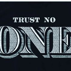 a black t - shirt with the words trust no one printed in white on it