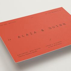 an orange and black business card with the word, alla & quinn on it