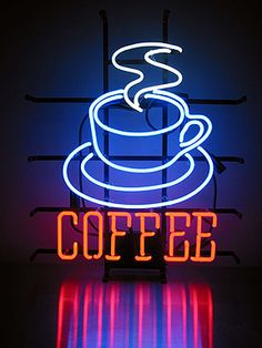 a neon sign that says coffee with a lit up cup in the middle on it