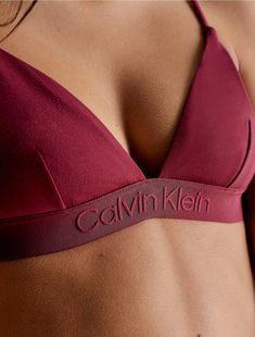 A triangle bikini top made with a minimal look. Designed with adjustable shoulder straps for a personalized fit. Finished with a Calvin Klein logo underband.  Material: 74% Polyamide, 26% Elastane. Shoulder Strap, Calvin Klein, Boxing, Calvin Klein Swimwear, Minimal Look, Motorcycle Outfit, Triangle Bra, Shoulder Straps, Cranberry