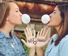 two women are blowing bubbles into each other's mouths with the caption tag ur best friend