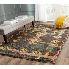 an area rug with a bench in the background