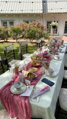 a long table set up outside for a tea party