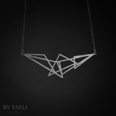 Triangle necklace – Beautiful geometric cluster of triangle necklace, its bound to be loved by the modern gal who loves fashion and minimalist design. ★ Comes in our signature gift box, ready for gift giving. ★ Available in Silver [Sterling silver chain & silver plated pendant] ★ Pendant size is 0.90"x2.80" . Thanks for shopping ... Silver Triangle Necklace For Gift, Minimalist Silver Triangle Necklace, Modern Triangle Jewelry For Gift, Geometric Silver Necklace For Gift, Silver Geometric Necklace For Gift, Geometric Sterling Silver Jewelry In Silver, Minimalist Sterling Silver Triangle Necklace, Minimalist Silver Geometric Jewelry, Modern Silver Geometric Necklace