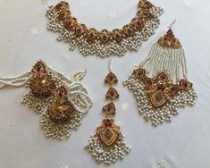 beautiful elegant white and multicoloured Indian Pakistani Jewellery set !  Popular trending jewellery sets!  Set includes stunning:  Necklace  Earrings  Tikka  Jhumar Pakistan Jewelry Pakistani Bridal, Festive White Sets With Latkans, White Wedding Sets With Latkans, Elegant Multicolor Sets With Latkans, Traditional White Kundan Necklace With Earrings, Traditional White Kundan Necklace With Matching Earrings, White Tilla Sets For Celebration, Elegant Multicolor Bridal Sets With Stone Work, Elegant Multicolor Bridal Sets For Festive Occasions