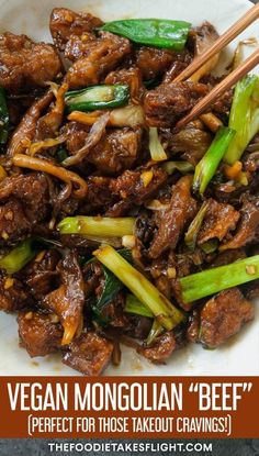 beef and vegetable stir fry with chopsticks in a white bowl