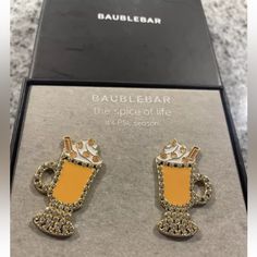 Add Some Sparkle To Your Fall Wardrobe With These Stunning Baublebar Earrings. The Spice Of Life Pumpkin Spice Latte Rhinestone Earrings Are Perfect For Any Occasion, Whether You're Dressing Up For A Night Out Or Simply Adding Some Glam To Your Everyday Look. The Earrings Feature A Gorgeous Orange Rhinestone In A Multi-Tone Gold Setting That Is Sure To Catch The Eye. The Stud Closure Ensures A Comfortable Fit, While The Dangle/Drop Style Adds Movement And Dimension. These Earrings Are A Must-Hav Christian Girl Fall, Fall Tags, Taylor Swift Eras Tour Outfit, Bling Gifts, Mickey Earrings, Earrings Food, Teacher Art, Minnie Mouse Earrings, Baublebar Earrings