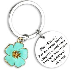 a keychain with a flower on it that says,'ohana blessing may always