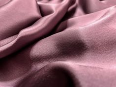 a close up view of a pink fabric