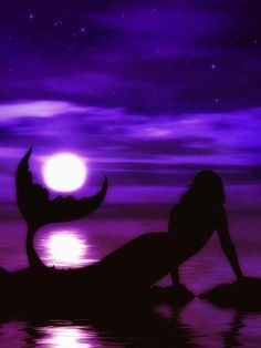 the silhouette of a woman is shown in front of a purple sky and water at night