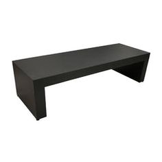 a black table sitting on top of a white floor