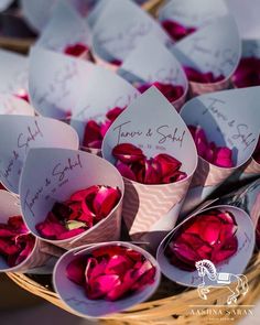 there are many rose petals in the basket for someone to put on their wedding day