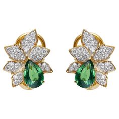 Crafted by GEMCOOK JEWELLERY, these 2.18ct Tsavorite Kazani Green Leaf Earrings are a stunning piece of art. The vibrant green tsavorite stones, totaling over 2 carats, are beautifully shaped into leaf designs, adding an elegant touch to any outfit. Channel your inner nature lover with these unique and breathtaking earrings. Full of life colors The temperament is more girlish than emerald Verdant green, spring spirit~ GUILD Kazani green R:2.18ct d:0.655ct 5.79g Verdant Green, Leaf Designs, Green Spring, Flower Tops, Vibrant Green, Kazan, Green Leaf, Color Of Life, 2 Carat