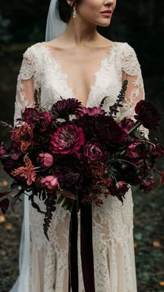 a woman in a wedding dress holding a bouquet