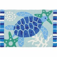 a blue and white rug with a turtle on it's back, surrounded by starfish