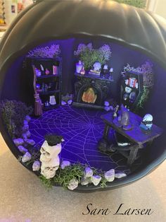 the inside of a fake halloween house with decorations