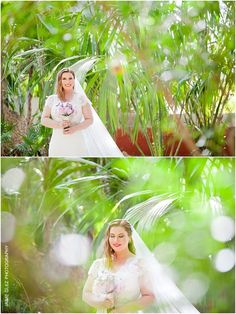 the bride is posing for pictures in her wedding dress and veil, surrounded by greenery