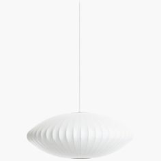 a white light hanging from a ceiling fixture