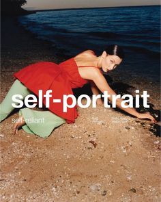 a woman kneeling down on the beach with her feet in the sand and text that reads self - portrait