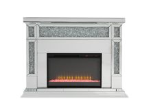 an electric fireplace with silver glitter on the sides and red flames in the middle, against a white background