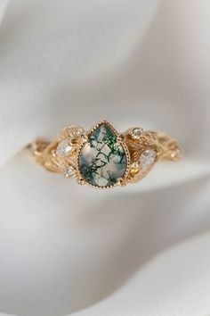 Pear moss agate engagement ring with diamonds, gold leaf branch proposal ring / Patricia | Eden Garden Jewelry™ Fairytale Engagement Ring, Pear Moss, Traditional Wedding Bands, Beaded Frame, Eden Garden, Pretty Engagement Rings, Nature Inspired Engagement Ring, Marquise Diamond Engagement Ring, Moss Agate Engagement Ring