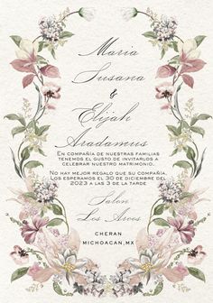 the wedding card is decorated with flowers and leaves