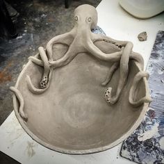 an octopus sculpture sitting on top of a table