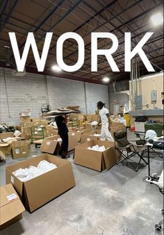 two men working in a warehouse with boxes on the floor and an advertisement over them that says work