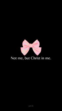 a pink bow with the words not me, but christ in me