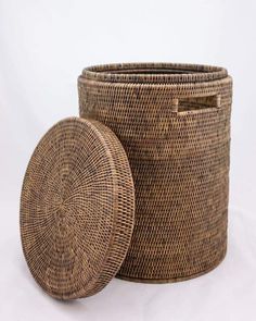 two woven baskets sitting next to each other