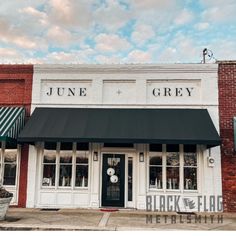 the front of a store called june and grey