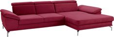 a red couch with a chaise lounger on it's back and footrests