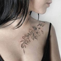 the back of a woman's neck with flowers on it and text that reads, 5