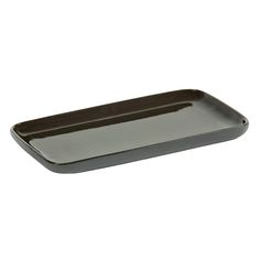 an empty black tray on a white background