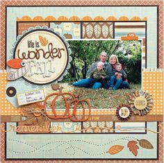 a scrapbook page with an image of two people sitting on the grass and one is holding