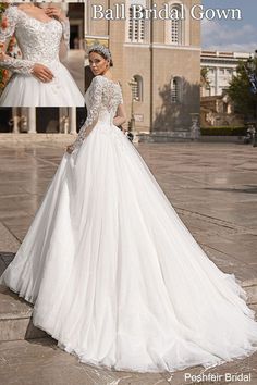 a woman in a wedding dress leaning against a wall