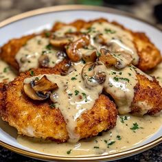 chicken with mushrooms and gravy on a plate