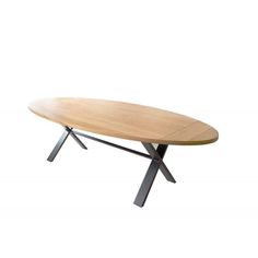 an oval wooden table with metal legs and a wood top, on a white background